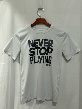 Adidas - White Tee with Black 'Never Stop Playing' Graphic